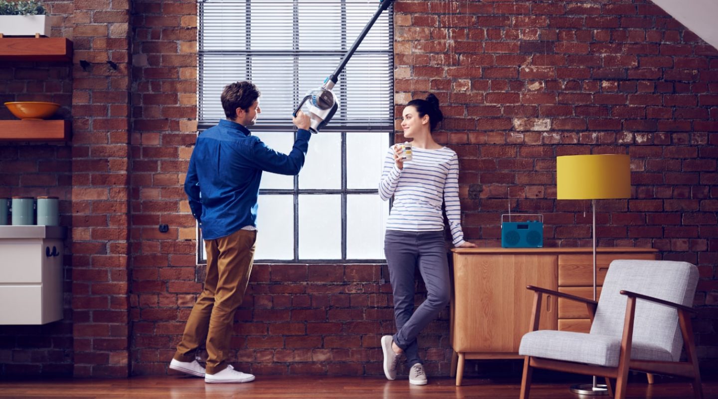 Campaign photography of couple standing in a kitchen